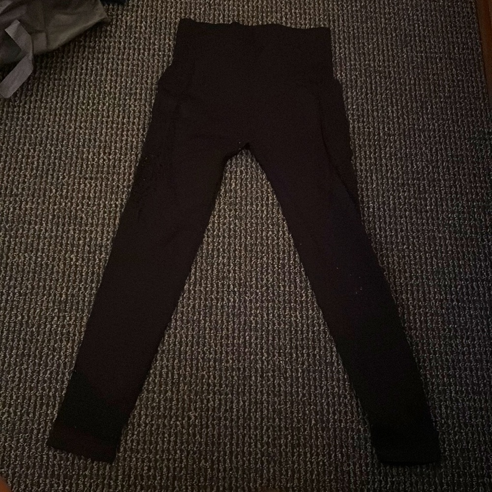 Selling black exercise leggings